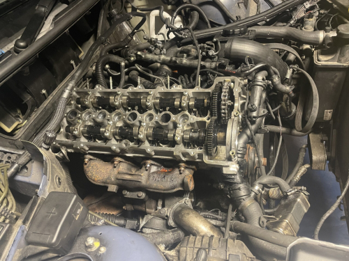 BMW M47 engine cylinder head at DMW Motor Cars, expert BMW engine service in Houston TX